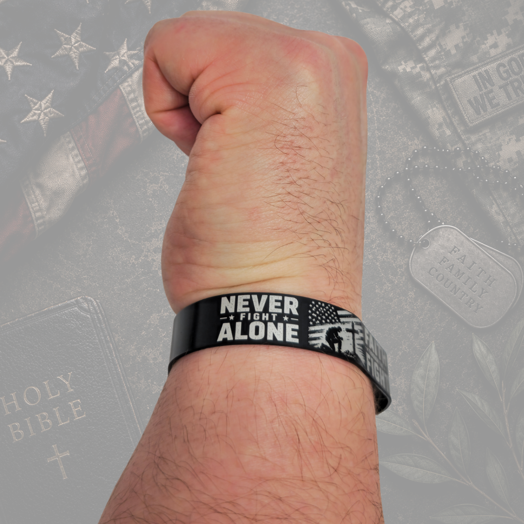 Christian military bracelet with Never Fight Alone design worn on wrist