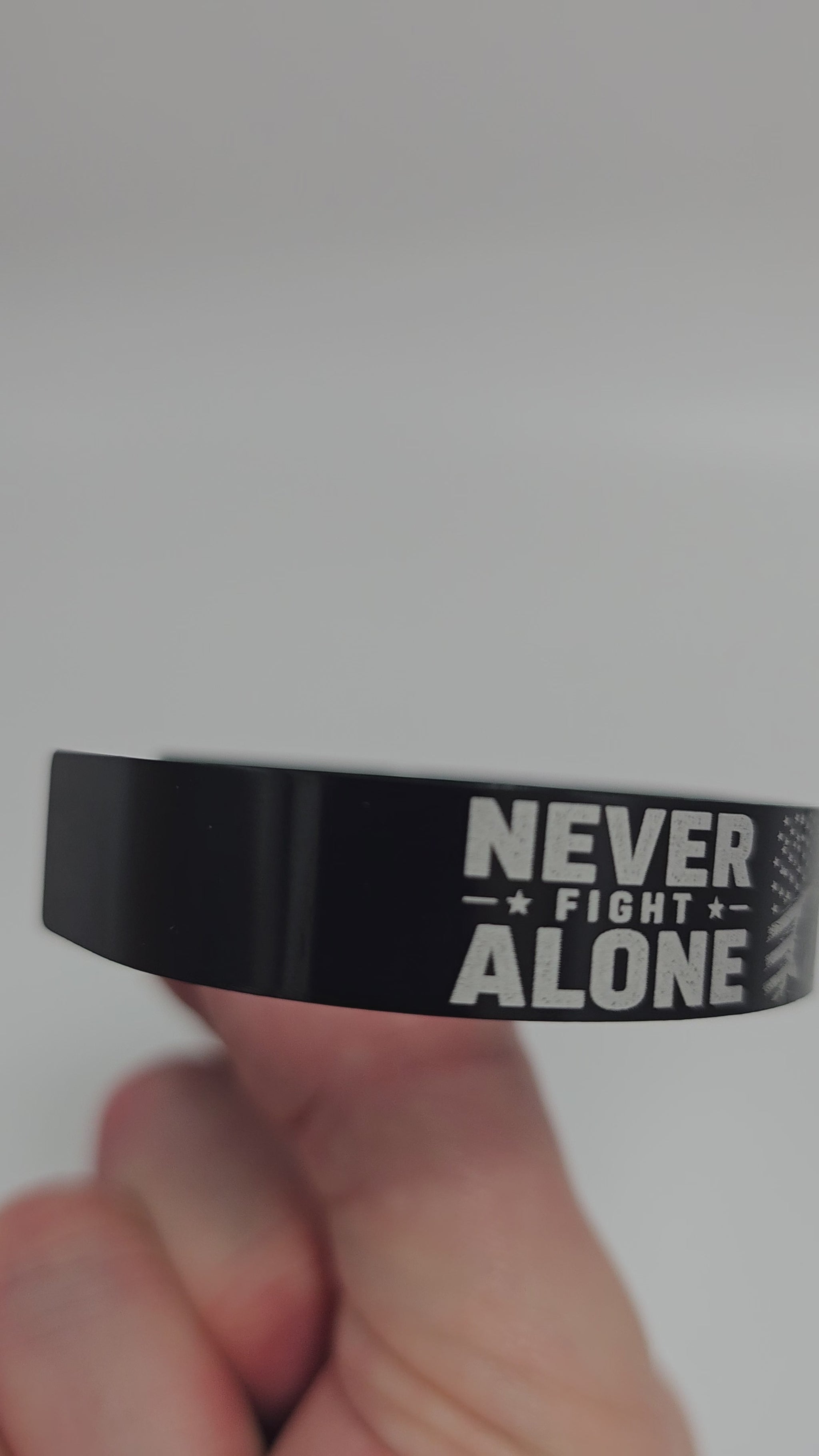 video of the never fight alone faith bracelet military inspired