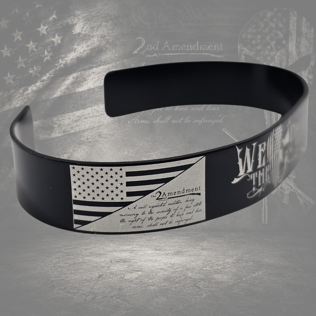 Side view of black Second Amendment patriotic cuff bracelet with silver laser engraving